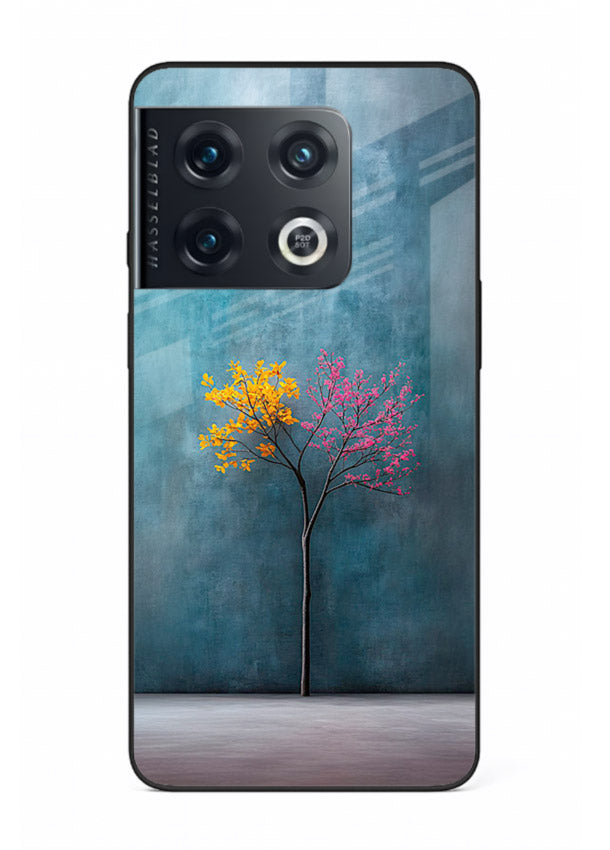 Blue tree artwork on OnePlus 10 Pro glass back cover with soft minimal artistic tones.