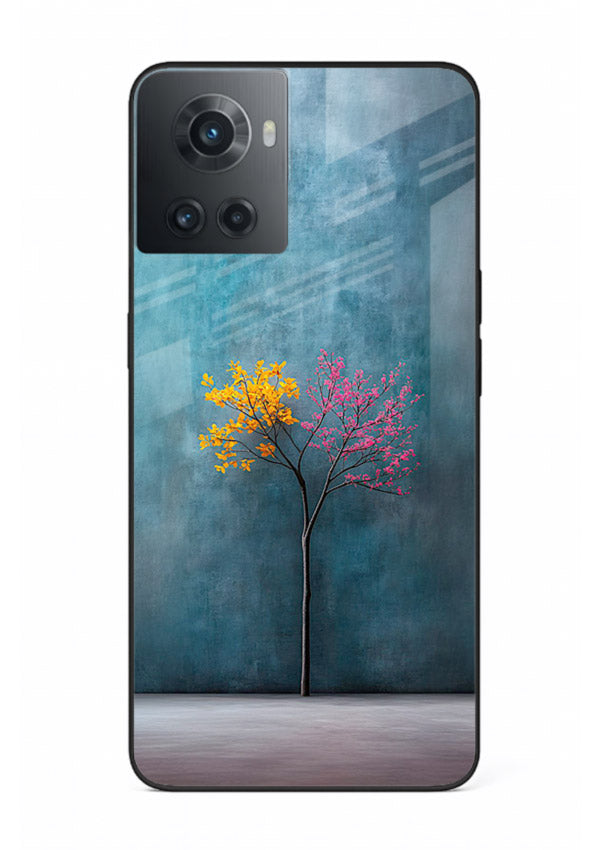 Blue tree artwork on OnePlus 10R glass back cover with soft minimal artistic tones.