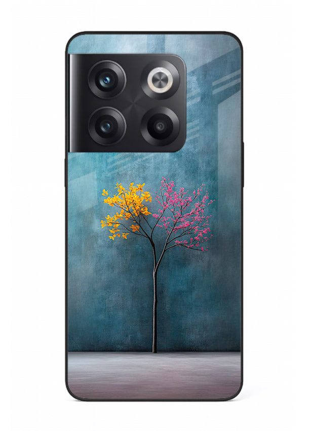 Blue tree artwork on OnePlus 10T glass back cover with soft minimal artistic tones.