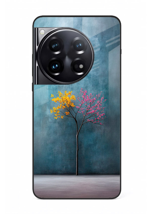 Blue tree artwork on OnePlus 12 glass back cover with soft minimal artistic tones.