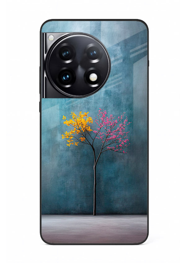 Blue tree artwork on OnePlus 12R glass back cover with soft minimal artistic tones.
