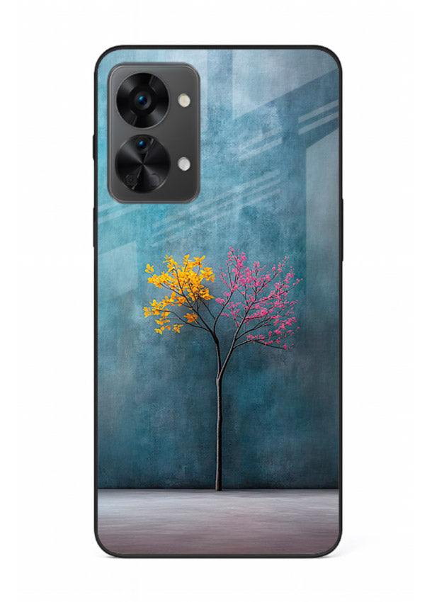 Blue tree artwork on OnePlus Nord 2T glass back cover with soft minimal artistic tones.