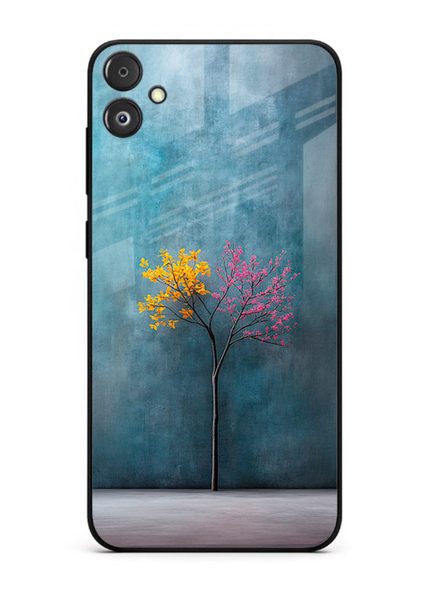 Blue tree artwork on Samsung F05 5G glass back cover with soft minimal artistic tones.