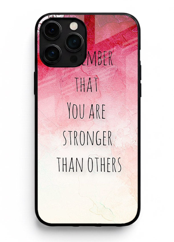 Watercolor determination quote printed on iphone 16 pro max glass back cover with gentle tones.
