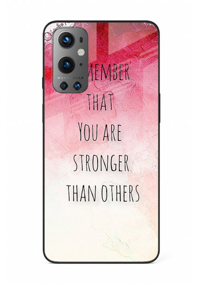 Watercolor determination quote printed on OnePlus 9 glass back cover with gentle tones.