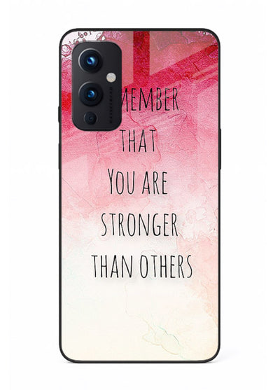 Watercolor determination quote printed on OnePlus 9 Pro glass back cover with gentle tones.