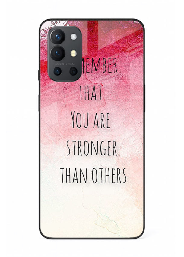 Watercolor determination quote printed on OnePlus 9R glass back cover with gentle tones.