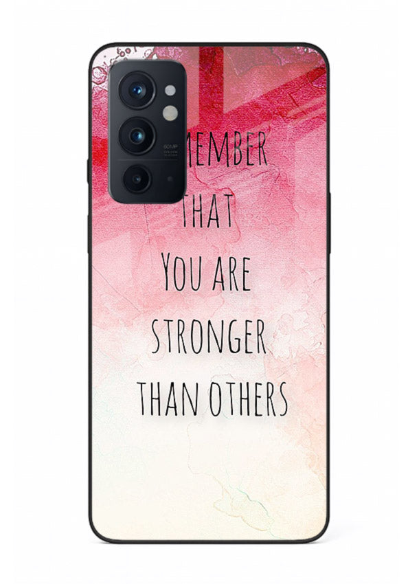 Watercolor determination quote printed on OnePlus 9RT glass back cover with gentle tones.