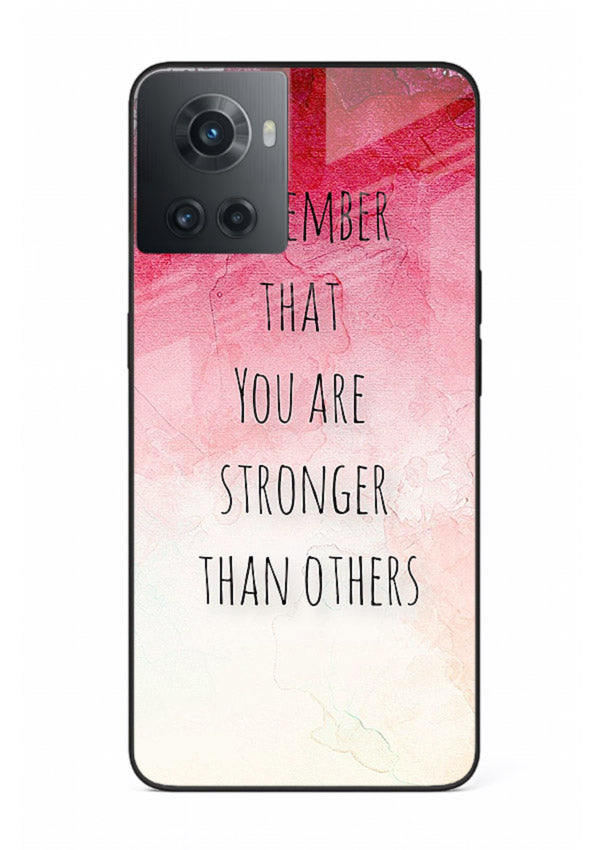 Watercolor determination quote printed on OnePlus 10R glass back cover with gentle tones.