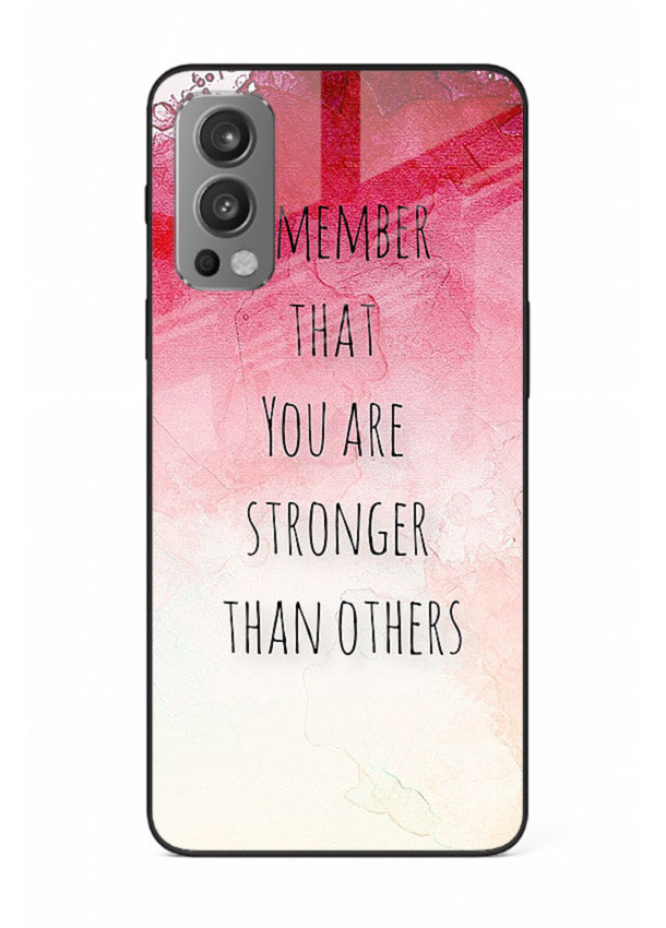 Watercolor determination quote printed on OnePlus Nord 2 glass back cover with gentle tones.