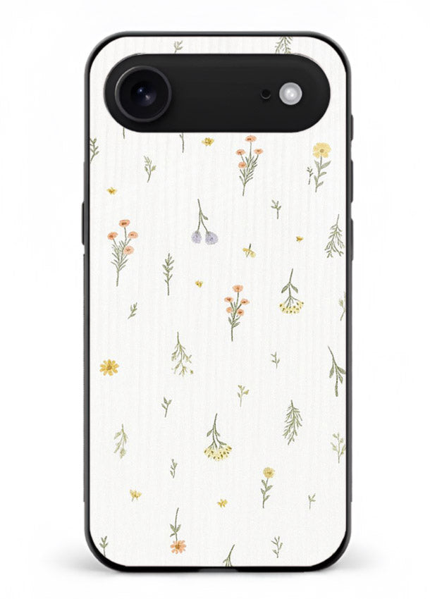Tiny floral pattern artwork on iphone 18 air glass back cover with scattered blooms.