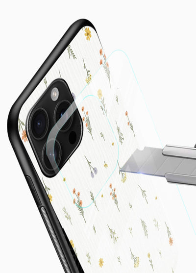 Tiny floral pattern artwork on glossy vibrant premium glass back cover with scattered blooms. - Angle Blade