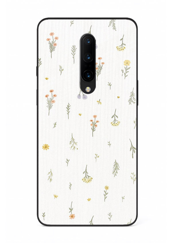 Tiny floral pattern artwork on OnePlus 8 glass back cover with scattered blooms.