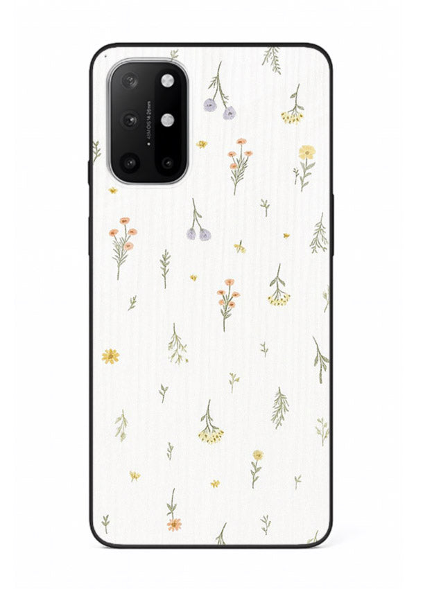 Tiny floral pattern artwork on OnePlus 8T glass back cover with scattered blooms.