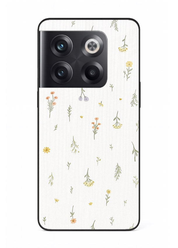 Tiny floral pattern artwork on OnePlus 10T glass back cover with scattered blooms.