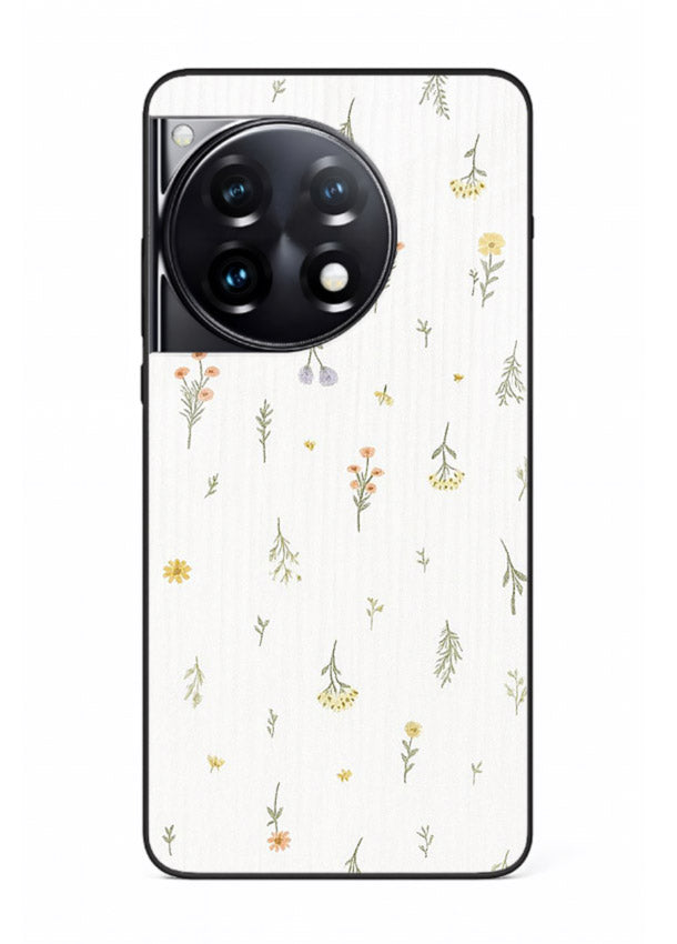 Tiny floral pattern artwork on OnePlus 12R glass back cover with scattered blooms.