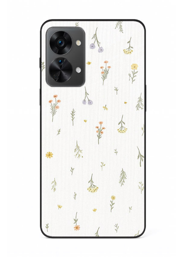Tiny floral pattern artwork on OnePlus Nord 2T glass back cover with scattered blooms.
