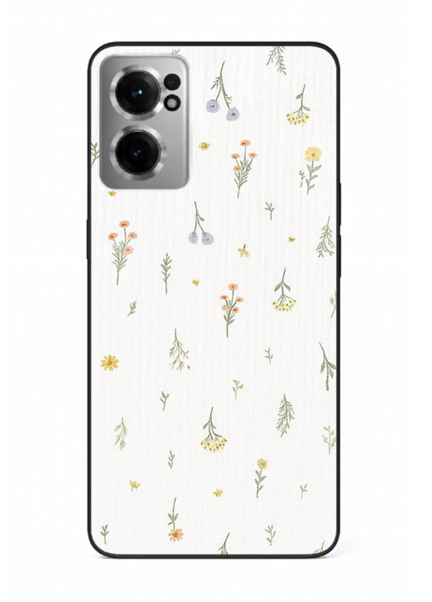 Tiny floral pattern artwork on OnePlus Nord CE2 5G glass back cover with scattered blooms.