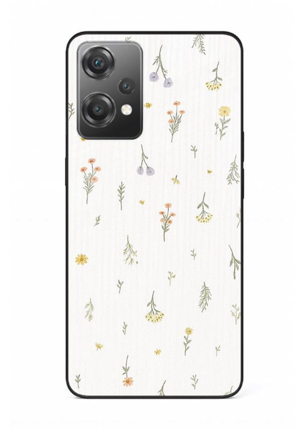 Tiny floral pattern artwork on OnePlus Nord CE2 Lite 5G glass back cover with scattered blooms.