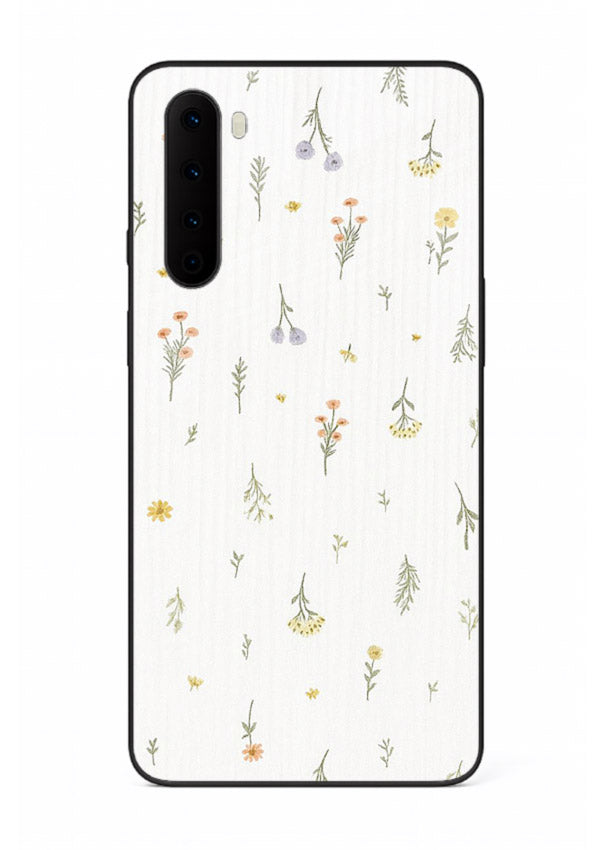 Tiny floral pattern artwork on OnePlus Nord glass back cover with scattered blooms.