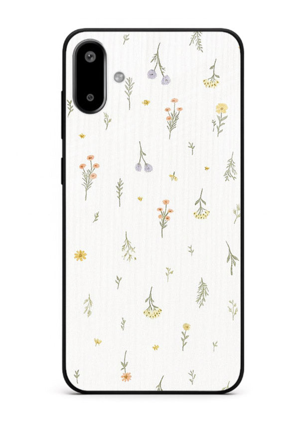 Tiny floral pattern artwork on Samsung F06 5G glass back cover with scattered blooms.
