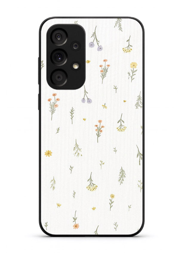 Tiny floral pattern artwork on Samsung M32 5G glass back cover with scattered blooms.