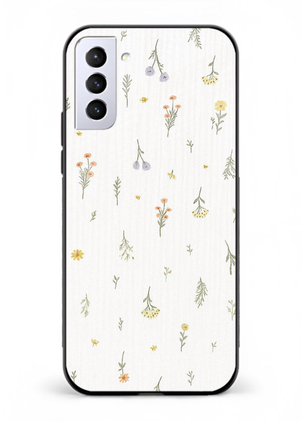Tiny floral pattern artwork on Samsung S21 Plus glass back cover with scattered blooms.