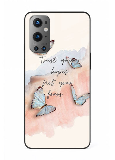 Butterfly hope artwork printed on OnePlus 9 glass back cover with gentle pastel tones.