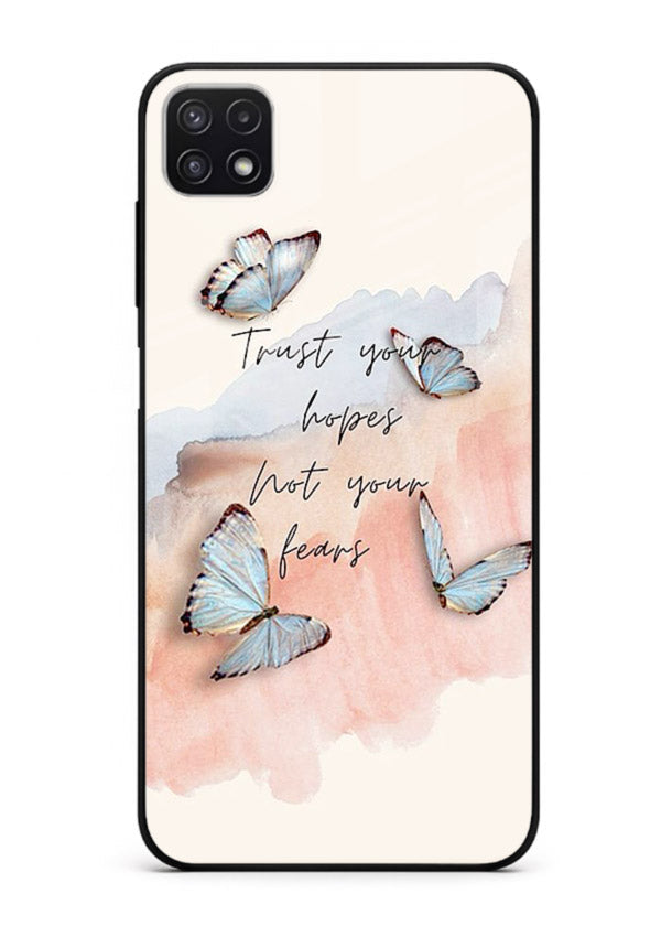 Butterfly hope artwork printed on Samsung F42 5G glass back cover with gentle pastel tones.