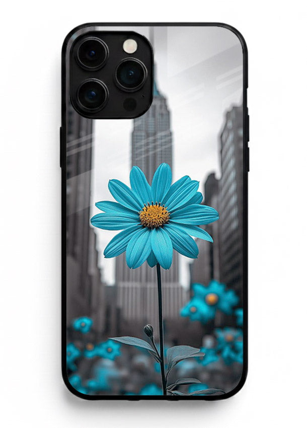 Blue daisy artwork on iphone 15 pro max glass back cover with bold modern floral styling.