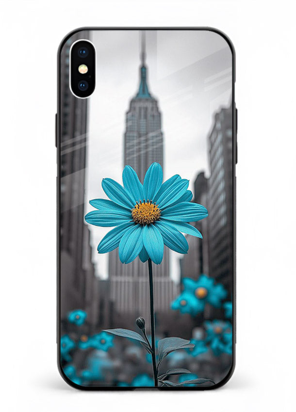 Blue daisy artwork on iphone xs max glass back cover with bold modern floral styling.