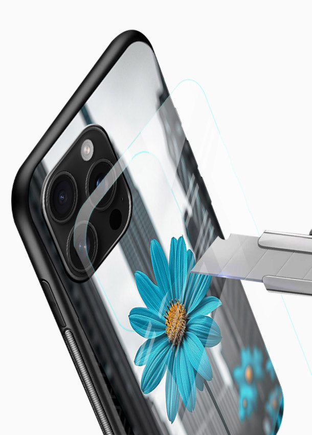 Blue daisy artwork on glossy vibrant premium glass back cover with bold modern floral styling. - Angle Blade