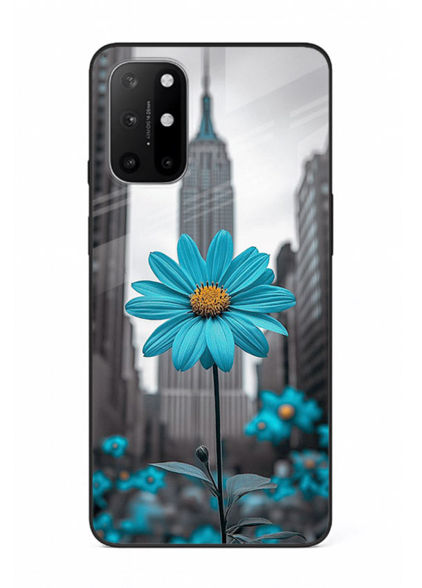 Blue daisy artwork on OnePlus 8T glass back cover with bold modern floral styling.