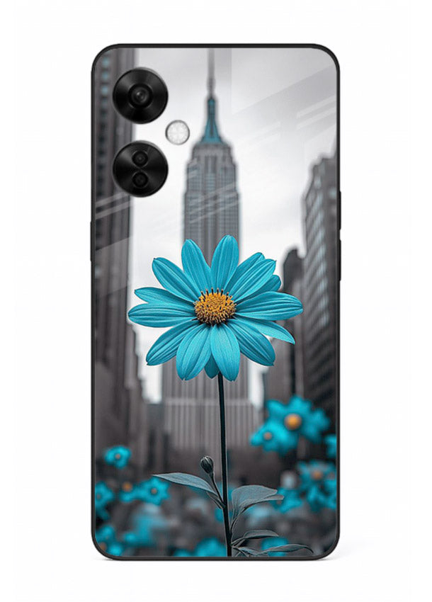 Blue daisy artwork on OnePlus Nord CE3 Lite glass back cover with bold modern floral styling.