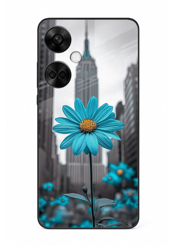 Blue daisy artwork on OnePlus Nord CE3 glass back cover with bold modern floral styling.