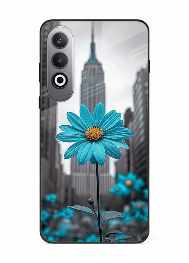 Blue daisy artwork on OnePlus Nord CE4 glass back cover with bold modern floral styling.