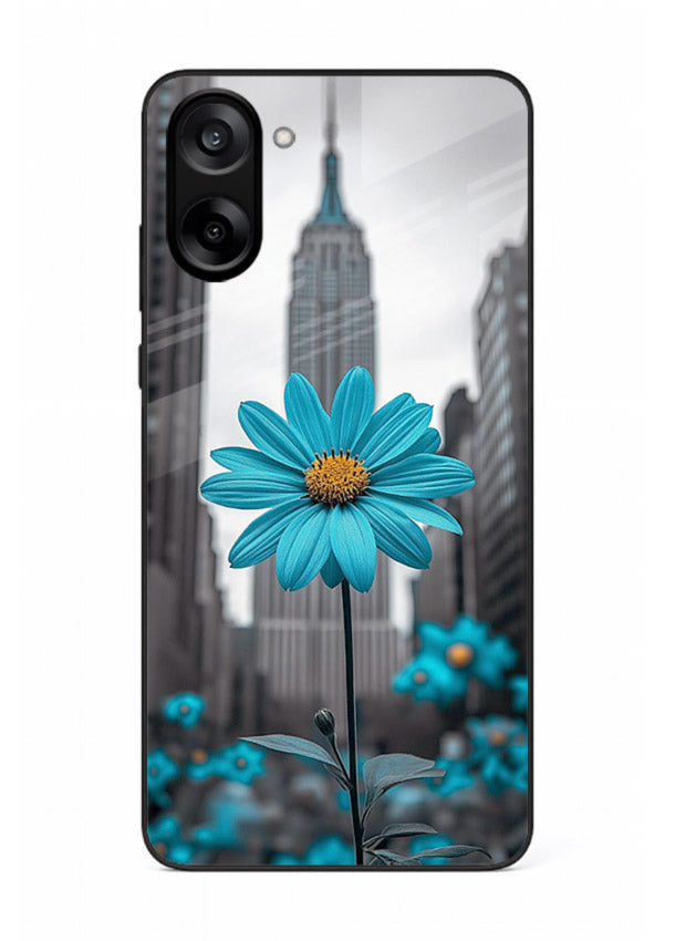 Blue daisy artwork on OnePlus Nord CE5 glass back cover with bold modern floral styling.