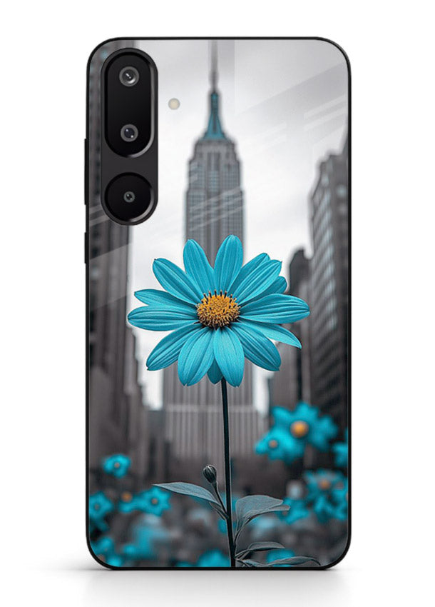 Blue daisy artwork on Samsung F16 5G glass back cover with bold modern floral styling.