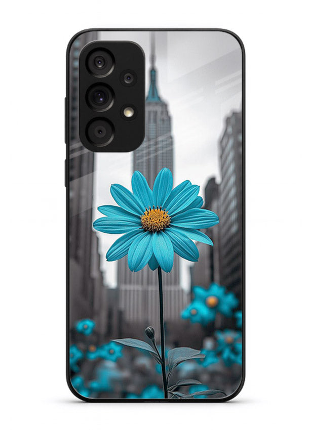 Blue daisy artwork on Samsung M32 5G glass back cover with bold modern floral styling.
