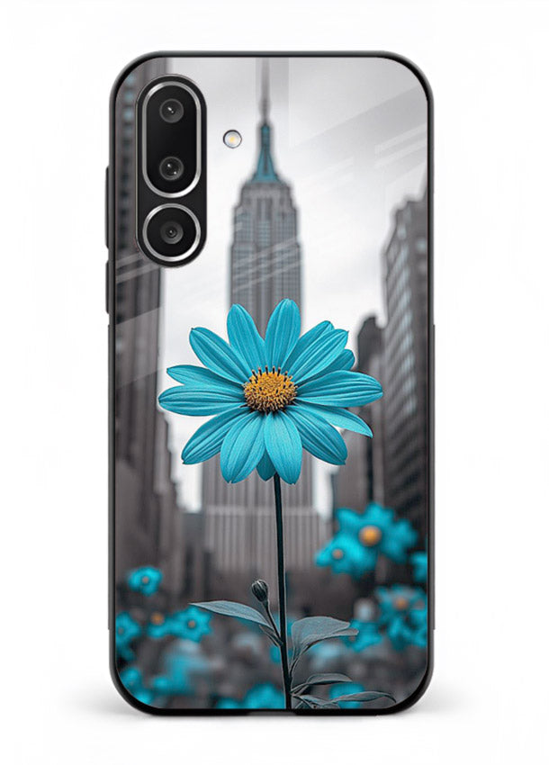 Blue daisy artwork on Samsung M56 5G glass back cover with bold modern floral styling.