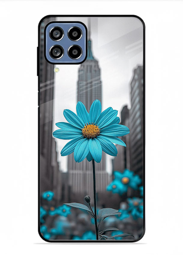 Blue daisy artwork on Samsung A22 4G glass back cover with bold modern floral styling.