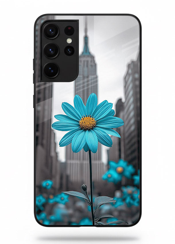 Blue daisy artwork on Samsung S21 Ultra glass back cover with bold modern floral styling.