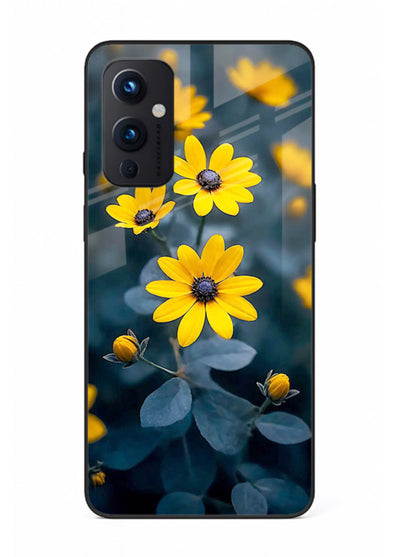 Yellow wildflower artwork on OnePlus 9 Pro glass back cover with rustic botanical tones.