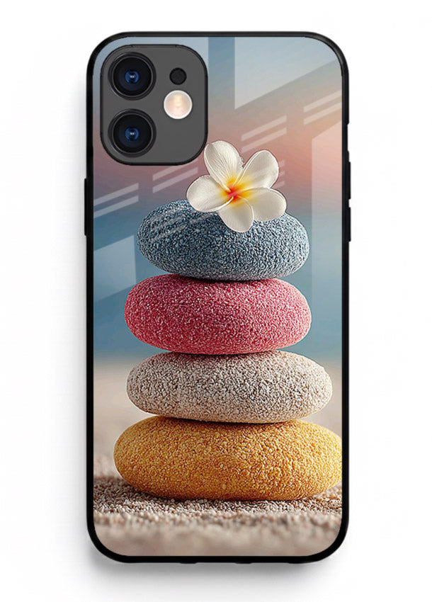 Zen stone botanical artwork on iphone 12 glass back cover with calming minimal tones.
