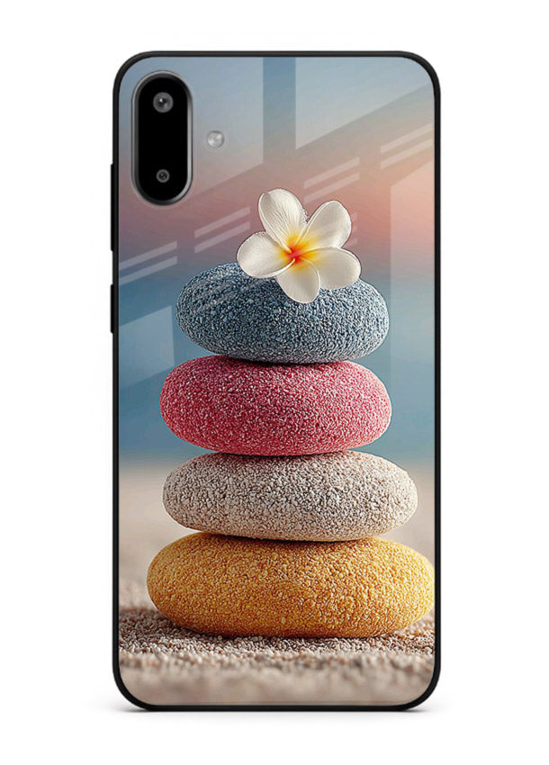 Zen stone botanical artwork on Samsung F06 5G glass back cover with calming minimal tones.