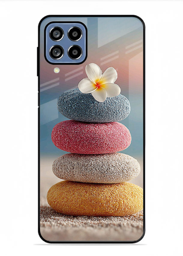 Zen stone botanical artwork on Samsung F12 5G glass back cover with calming minimal tones.
